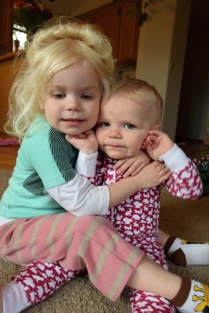 At 3 years old, she is learning to be a great big sister. Ten Thousand Hour Mama