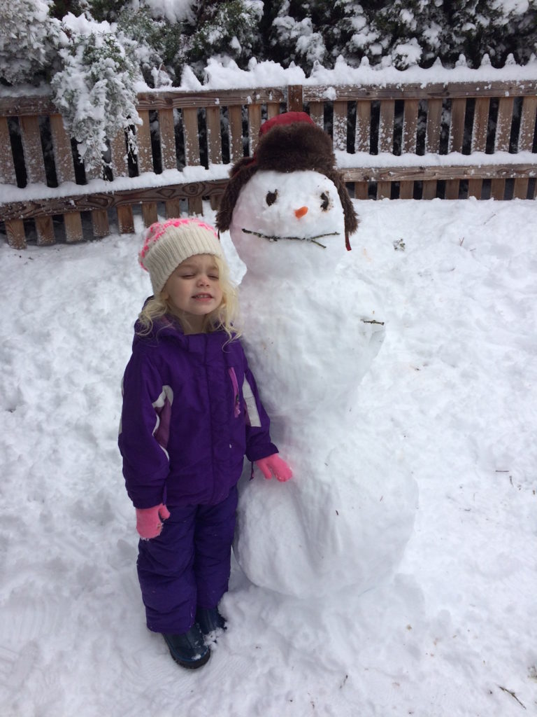 My daughter was so proud of our family's first snowman. Ten Thousand Hour Mama