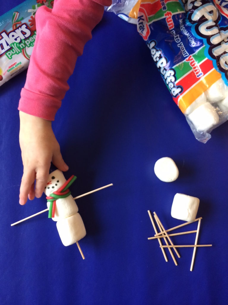 Kids can't keep their hands off these adorable marshmallow snowman topper edible crafts, made with Twizzlers! Ten Thousand Hour Mama