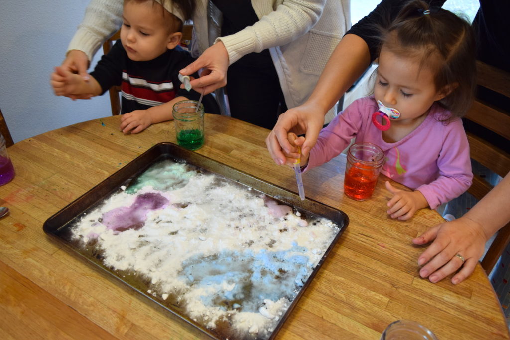 Homeschool preschool science experiment with baking soda, vinegar and watercolors. Ten Thousand Hour Mama